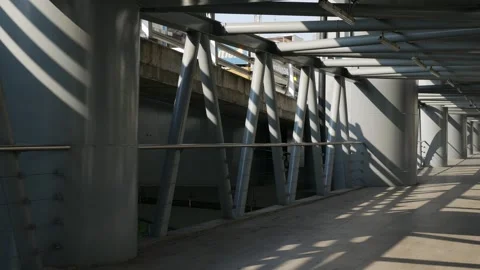 Dramatic perspective of an elevated walkway Stock Footage 332831489
