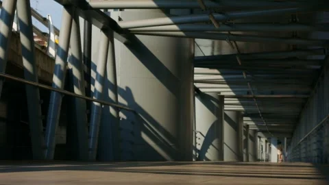 Dramatic perspective of an elevated walkway Stock Footage 333292364