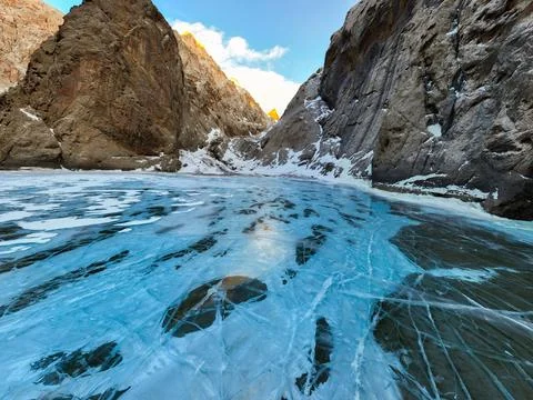 Dramatic perspective of frozen blue ice in a mountain gorge Stock Photos