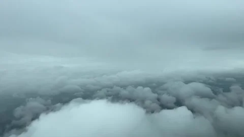 A dramatic pilot’s perspective shot from a jet’s cabin approaching to Stock Footage 241882400