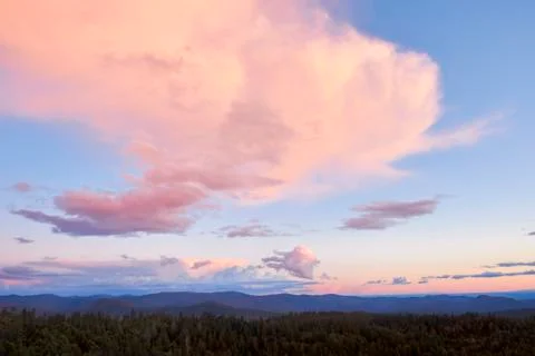 Dramatic Pink Clouds Over Secluded Wilderness At Sunset Stock Photos