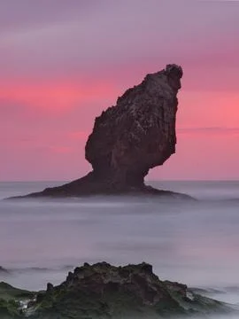 Dramatic Pink Sunset Sky over Buelna Stack - Spectacular long exposure of t.. Stock Photos