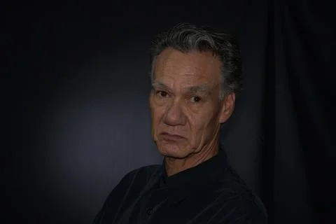 Dramatic Portrait of a Mature Man Stock Photos