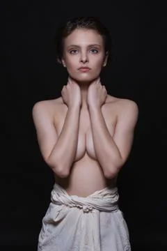 Dramatic portrait of a young seductive beautiful brunette girl with short hai Foto stock