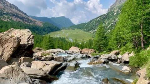 Dramatic Preda Rossa Alpine scenery landscape with flowing cold water river Stock Footage 160772432
