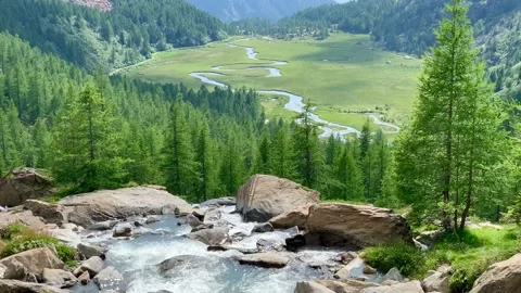 Dramatic Preda Rossa Alpine scenery landscape with flowing cold water river i Stock Footage 160834367