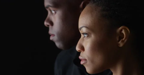 Dramatic profile rack focus of two young black people Video stock 42656931
