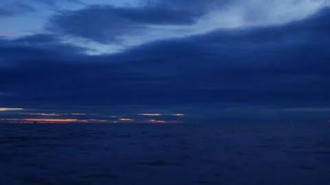 Dramatic Purple Blue Twilight Sky Over Ocean Sea at Dusk Stock Footage 318213822