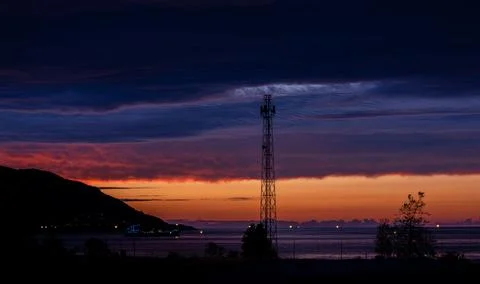 Dramatic purple, orange, blue sky, beautiful colorful sunset sky over the sea Stock Photos