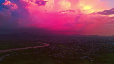 Dramatic Purple Sunset with Storm Clouds Over Kon Tum Landscape, Vietnam Stock Footage 322343136