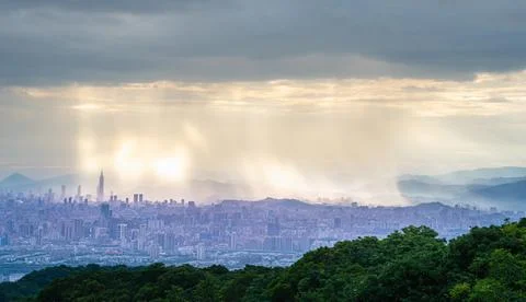 Dramatic Rain and Light over Taipei from Shulin Dadao Mountain. Stock Photos