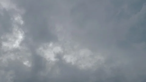 Dramatic rain cloud moving above moody dark sky Stock Footage 93778604