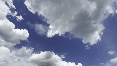 Dramatic Rain Clouds and Dark Blue Sky Background 4k handheld shot Stock Footage 197169898
