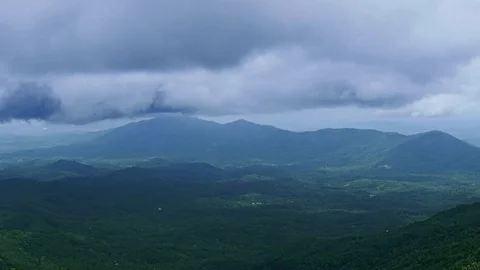 Dramatic Rain Clouds on a Mountain Chain Time Lapse 動画素材 78327587