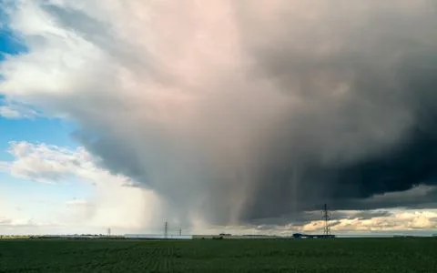 Dramatic rain or hail cloud over a field in Isle of Thanet, Kent. Stock Photos