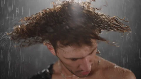 Dramatic Rain Portrait that showcases Intense Expressions and powerful emotions Stock Footage 313633574