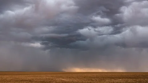 Dramatic rain storm moving over the landscape with lightning Stock Footage 120153729