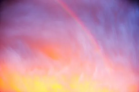 A dramatic rainbow at sunset over Ambleside during stormy weather, Lake Distr Foto stock