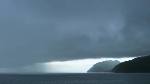 Dramatic rainy clouds over the sea in Izu peninsula, Shizuoka Prefecture, Japan Stock Footage 249639107