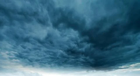 Dramatic rainy sky and dark clouds Stock Photos