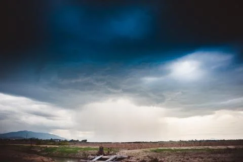 Dramatic rainy sky and dark clouds.The sky is covered with black storm clouds 스톡 사진