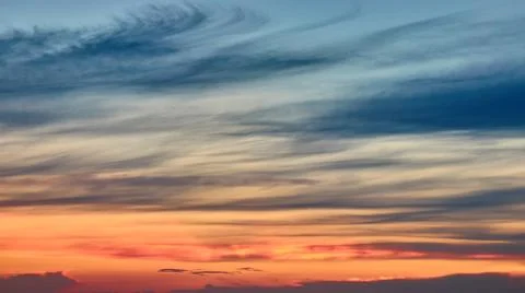 Dramatic red and orange sky and clouds. Red-orange clouds at sunset sky. Warm Stock Photos