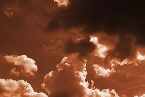 Dramatic red black orange sky with scary hellish clouds and terrible shadows Foto stock