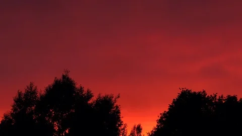 Dramatic red clouds and sunset Stock Footage 98553100