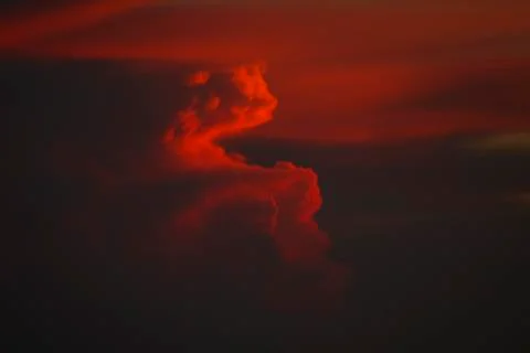 Dramatic red clouds during sunset in arica 写真素材