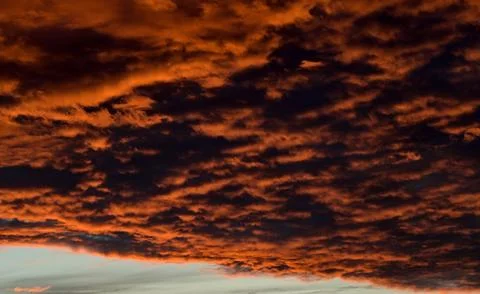 Dramatic Red clouds for pattern background. A burning sky in a horror movie.  Foto stock