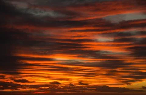 Dramatic red sky with clouds; Caloundra, Queensland, Australia Stock Photos