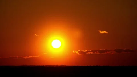Dramatic Red Sky Sunset Timelapse with Silhouetted Horizon Stock Footage 316552330