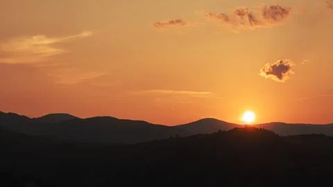 Dramatic red sunset in the mountains Stock Photos