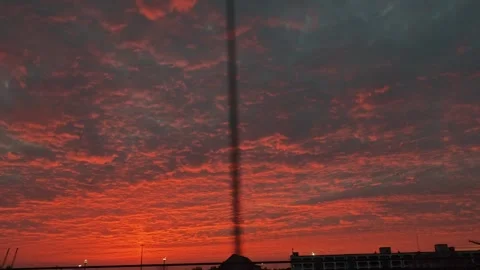 Dramatic Red Sunset Sky over Industrial Area 库存影片 346466398