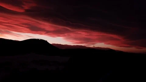 Dramatic red sunset in winter mountains Stock Footage 123359747