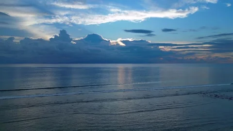 Dramatic Reflecting cloudy sky over calm ocean waters. Best aerial view drone Stock Footage 340794522