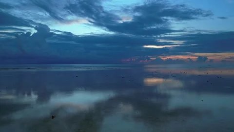 Dramatic Reflecting cloudy sky over calm ocean waters. Unique aerial view drone Stock Footage 344611732