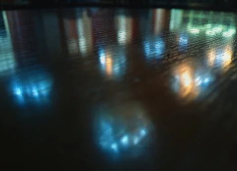 Dramatic reflection on the wooden table background Stock Photos