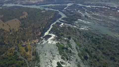 Dramatic reveal of a huge mountain waterfall  in Don Khon, Laos. Stock Footage 101934686
