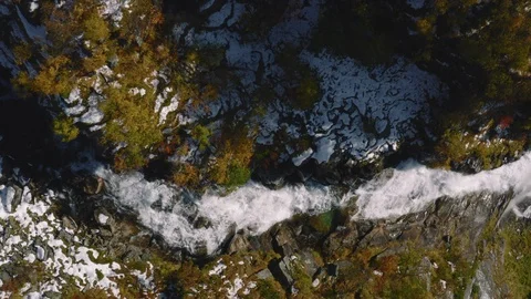 Dramatic reveal of a northern mountain waterfall Stock Footage 118817823