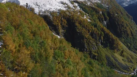 Dramatic reveal of a northern mountain waterfall Stock Footage 118826281
