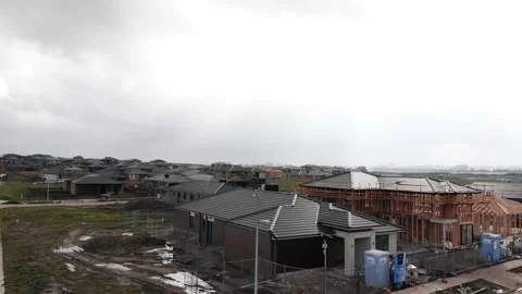 Dramatic Rising View of Large Scale Housing Estate Construction Aerial 4K Stock Footage 139123346