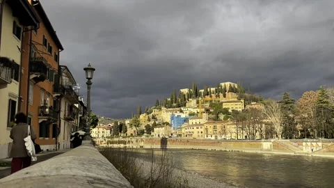 Dramatic Riverfront View of Verona with Stormy Sky Stock Footage 309932626