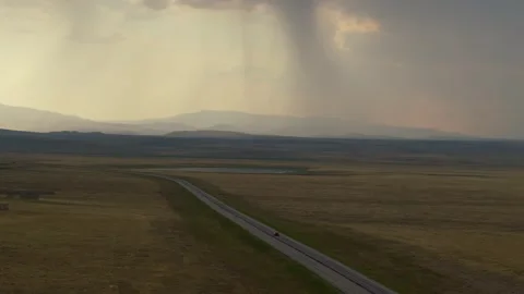 Dramatic Road Trip Through Wyoming's Vast and Open Countryside Stock Footage 316283998