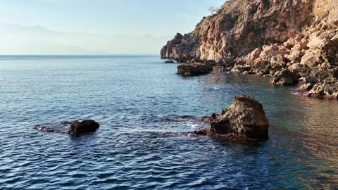 Dramatic Rock Formations Along Antalya Sea Stock Footage 340831975