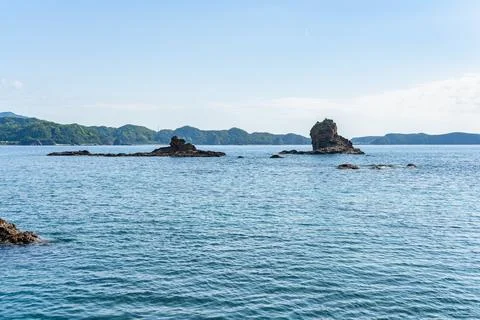 Dramatic rock formations on the coast of Pacific Ocean in Nachikatsuura Stock Photos