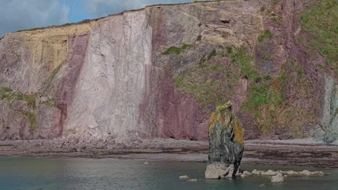 Dramatic Rockfall fragile sea cliffs and coastal erosion ,Copper Coast Stock Footage 348343612