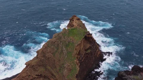 Dramatic Rocky Cliff with Waves Crashing Madeira Portugal Aerial View Stock Footage 332707084