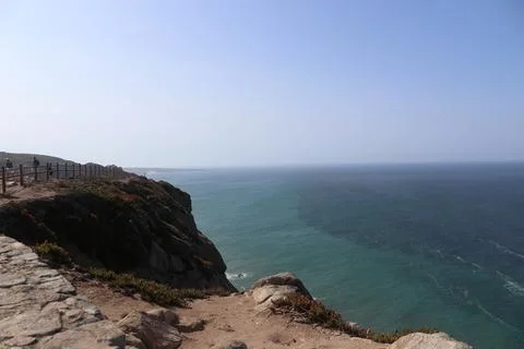 Dramatic rocky cliffs and Atlantic Ocean at Cabo da Roca, Portugal. Stock Photos