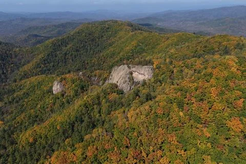 Dramatic Rocky Cliffs in Autumn Mountain Forest in Jilin Stock Photos